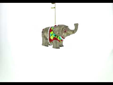 Adorno navideño de cristal con forma de elefante de circo tocando la trompeta