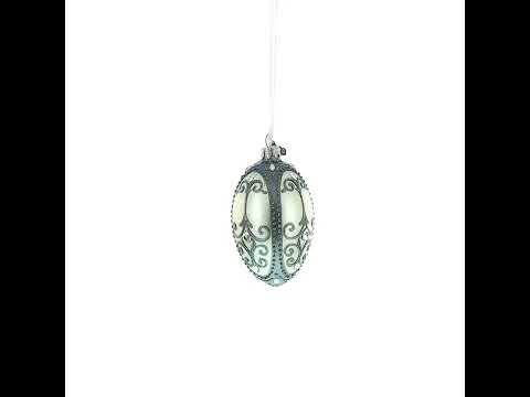 Silver Scrolls on White Glass Egg Ornament 4 Inches