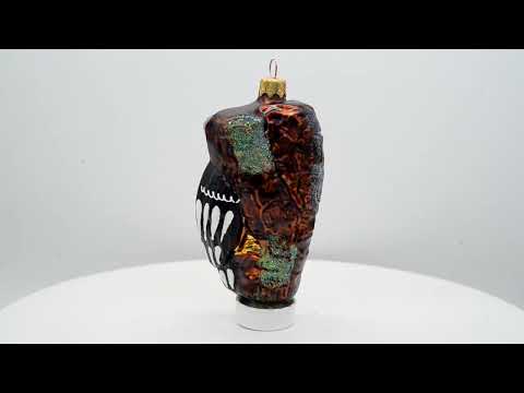 Adorno navideño de cristal en miniatura con forma de pájaro carpintero en una rama