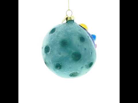 Astronaut Floating in Outer Space Glass Christmas Ornament