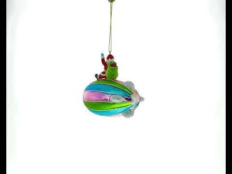 Adorno navideño de cristal con forma de Papá Noel volando en un zepelín
