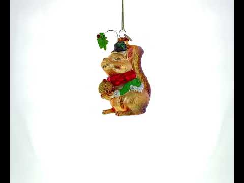 Squirrel Cradling an Acorn Glass Christmas Ornament