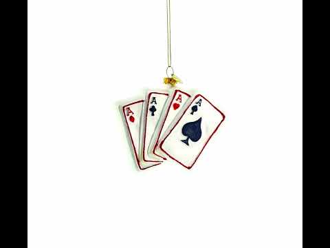Diversión con juegos: Adorno navideño de vidrio soplado con fichas de casino y naipes