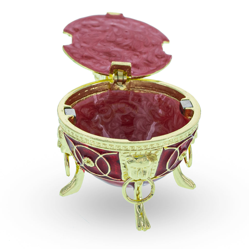 Golden Lion in the Jeweled Cage Egg Figurine , dimensions in inches: 3 x 2.2 x 2.2