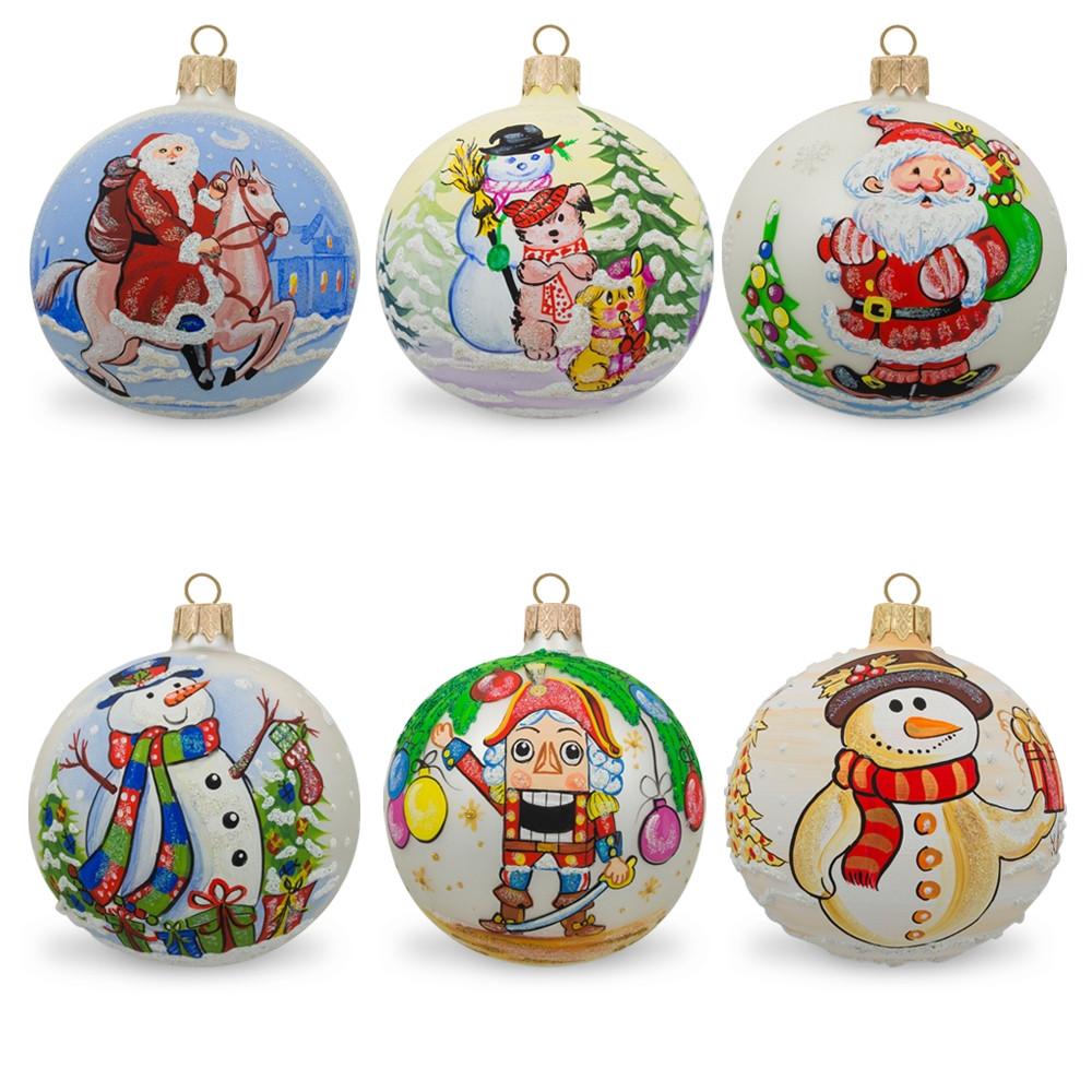 Glass Set of 6 Glass Ball Christmas Ornaments - Snowmen, Santa's & Nutcracker in Multi color Round