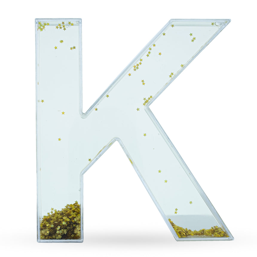 Letter K Glitter-Filled Acrylic Snow Globe in Clear color
