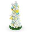 Resin Easter Ascent: Bunnies Climbing Easter Egg Tree Figurine in Multi color