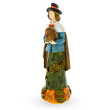 Thanksgiving Tradition: Pilgrim Man Holding Turkey Figurine in Multi color,  shape