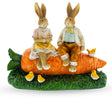 Easter Love: Bunny Couple Sitting on Carrot Figurine in Multi color,  shape